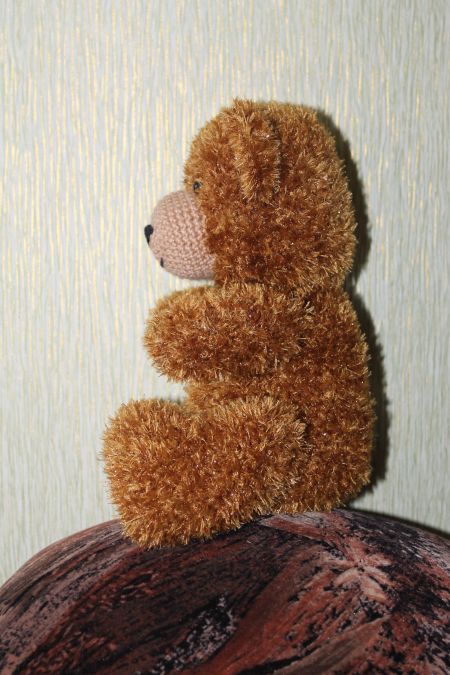 Плюшевый мишка в профиль